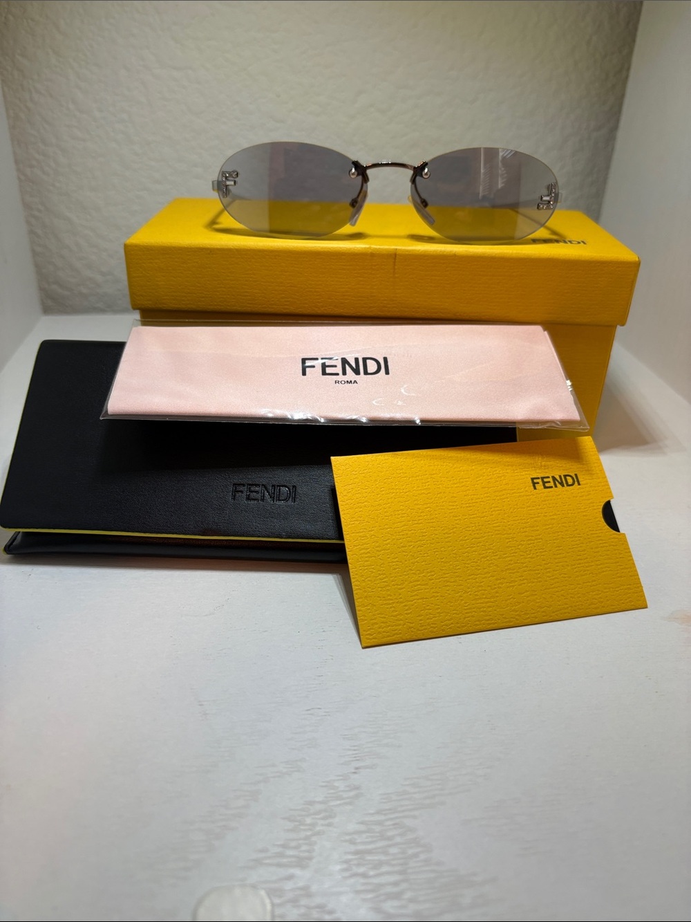 Authentic Fendi First Oval Sunglasses with Crystal embellished F logo on frames